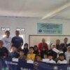 Komunitas keuangan dan motor roda dua BRI memegang program sosial untuk anak yatim piatu